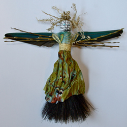 Guardian Relic with parrot feathers